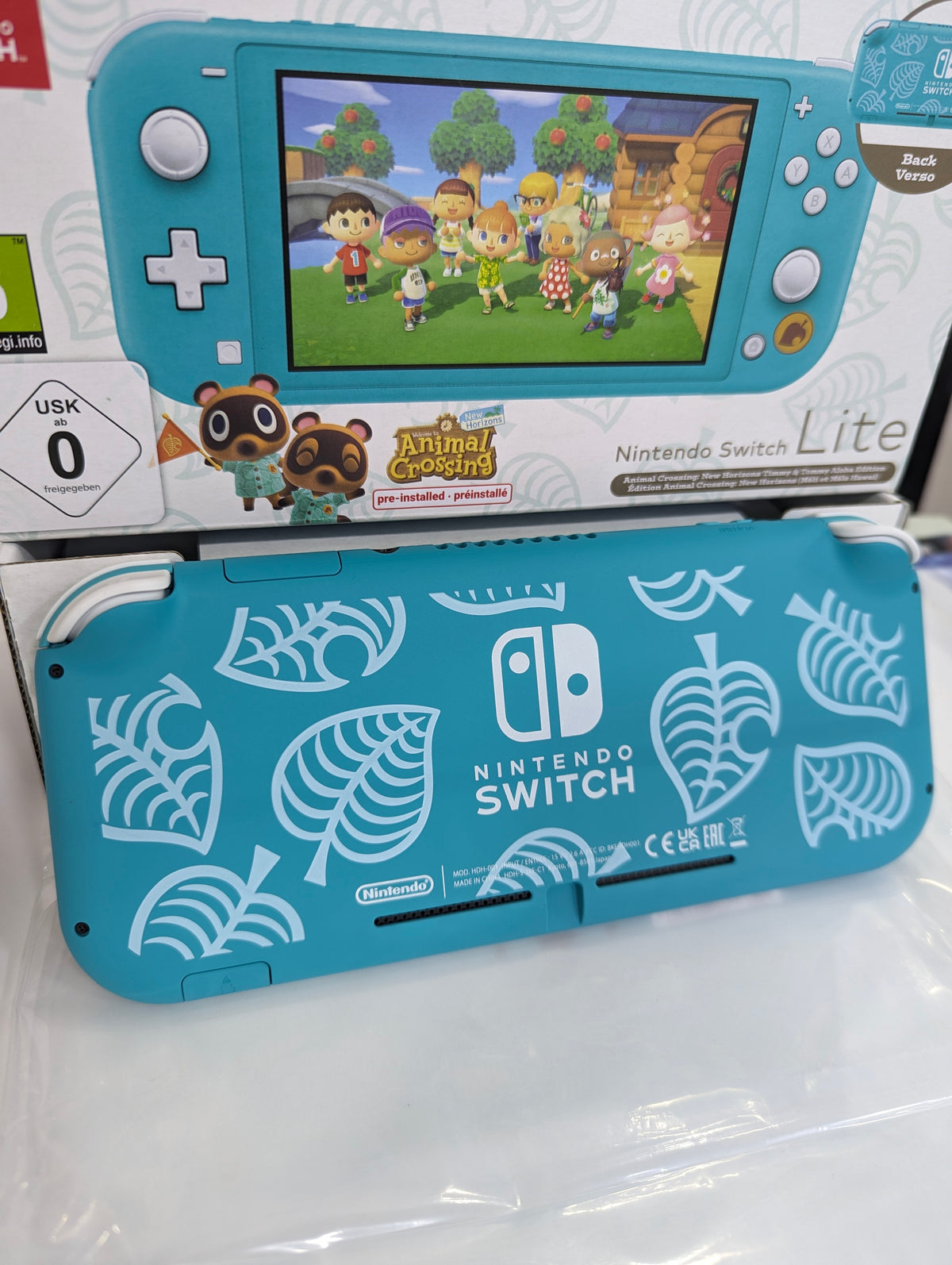جهاز Nintendo Switch Lite نسخة Animal Crossing (معدّل + ألعاب) سعة 128 جيجابايت مستعمل♻️